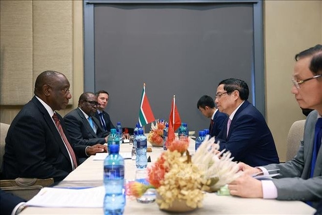 At the meeting between Vietnamese Prime Minister Pham Minh Chinh and South African President Cyril Ramaphosa on November 21. (Photo: VNA) matamela-cyril-ramaphosa-talks-vna.jpg