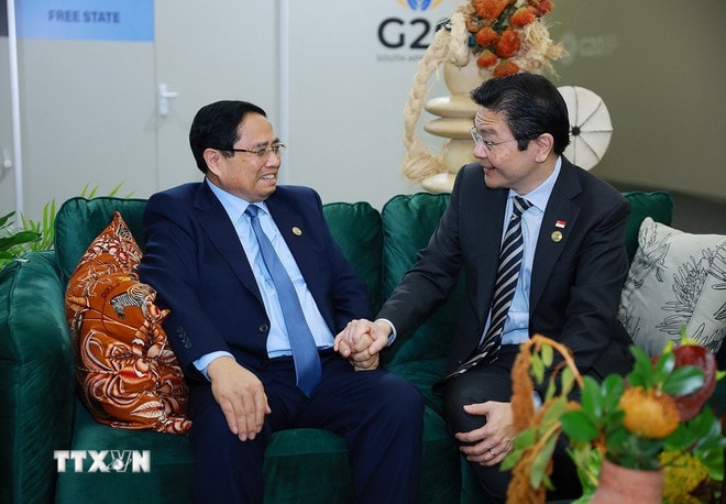 ttxvn-2311-thu-tuong-gap-thu-tuong-singapore-2.jpg