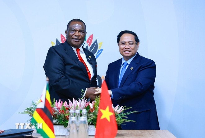 ttxvn-thu-tuong-gap-pho-tong-thong-zimbabwe-1.jpg