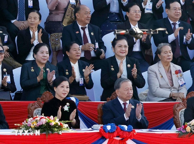 ttxvn-tong-bi-thu-to-lam-va-phu-nhan-du-le-ky-niem-50-nam-quoc-khanh-lao-8445078-2.jpg