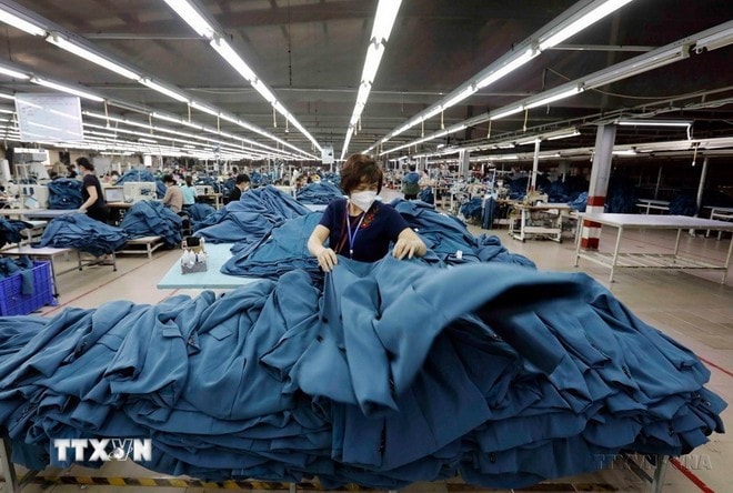 Textiles for export produced at Ho Guom Group JSC in Hung Yen province (Photo: VNA) economic2.jpg