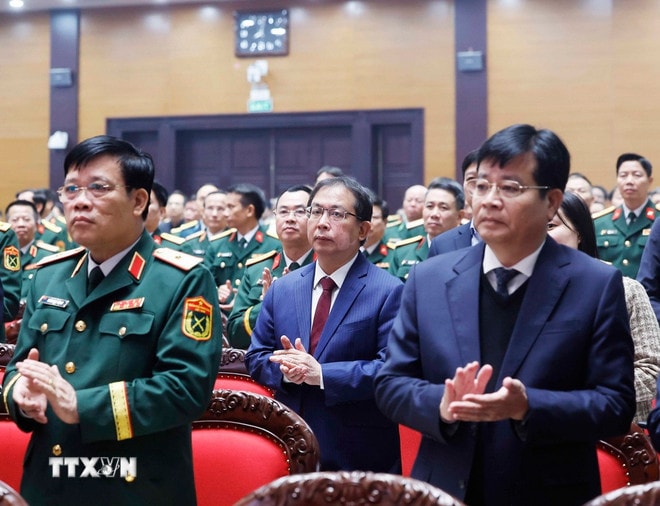 Các đại biểu tham dự buổi lễ. (Ảnh: Thống Nhất/TTXVN) ttxvn-1401-tong-bi-thu-tong-cuc-hau-can-ky-thuat-15.jpg