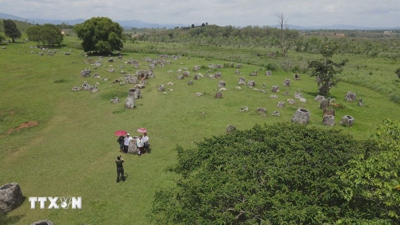 Tourists visit the Plain of Jars in Xiengkhouang, Laos.(Photo: VNA)