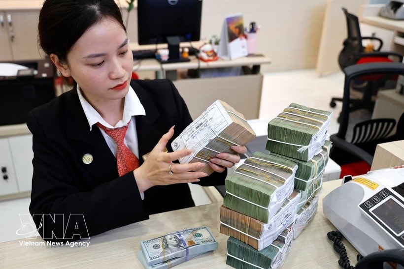 Banks roll out multiple credit solutions to accompany and support businesses. (Photo: VNA)
