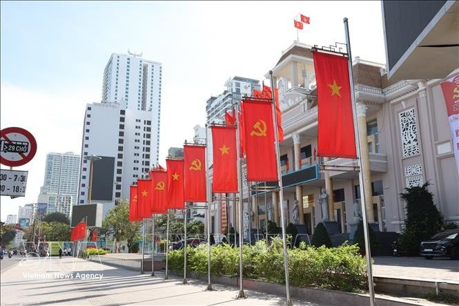 Flags and banners are lavishly displayed in front of the Khanh Hoa provincial People’s Committee headquarters. (Photo: VNA)