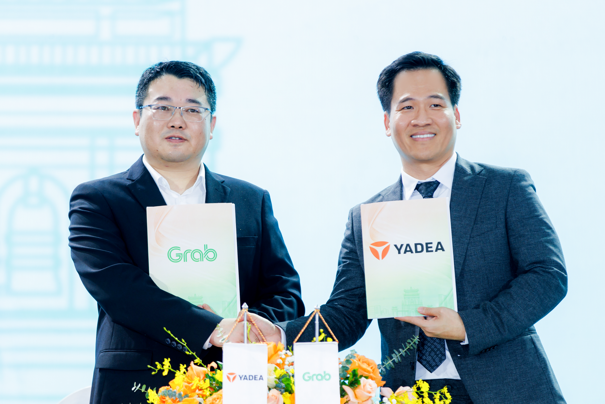 Grab hỗ trợ tài xế chuyển đổi sang xe máy điện - Ảnh 2. Grab hỗ trợ tài xế chuyển đổi sang xe máy điện - Ảnh 2.