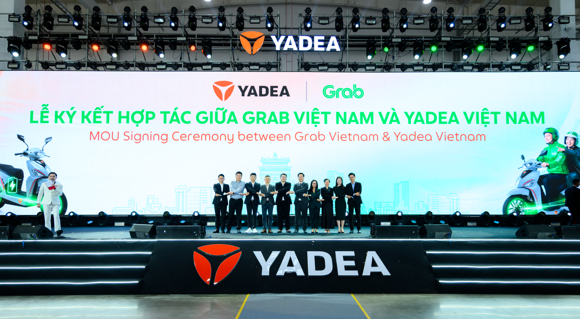 Grab hỗ trợ tài xế chuyển đổi sang xe máy điện - Ảnh 1. Grab hỗ trợ tài xế chuyển đổi sang xe máy điện - Ảnh 1.
