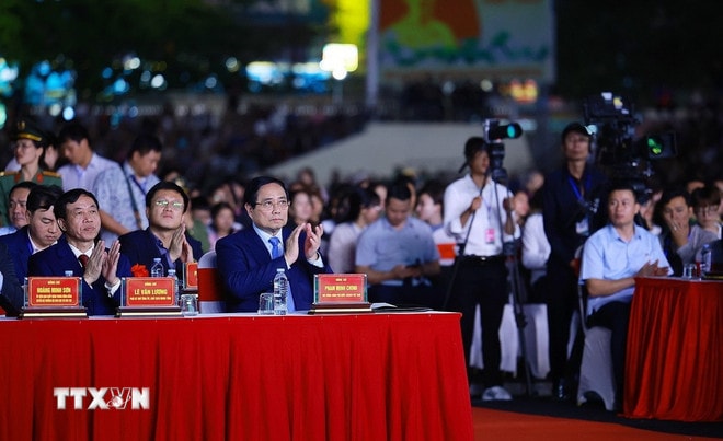 ttxvn-thu-tuong-pham-minh-chinh-du-le-khai-mac-le-hoi-hoa-ban-2.jpg