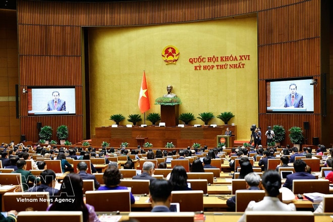 Chairman of the 15th NA Tran Tranh Man delivers the opening remarks at the first session of the 16th National Assembly. (Photo: VNA) vnanet-tranthanhman2.jpg