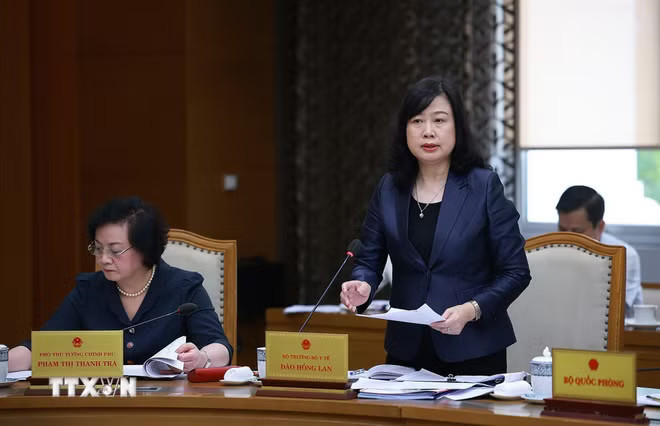 Bộ trưởng Bộ Lô Đề QQ88k Đào Hồng Lan báo cáo kết quả thực hiện nhiệm vụ được giao của ngành y tế. (Ảnh: Dương Giang/TTXVN) ttxvn-thuong-truc-chinh-phu-benh-vien-huu-nghi-viet-duc-va-benh-vien-bach-mai-co-so-2-1.jpg