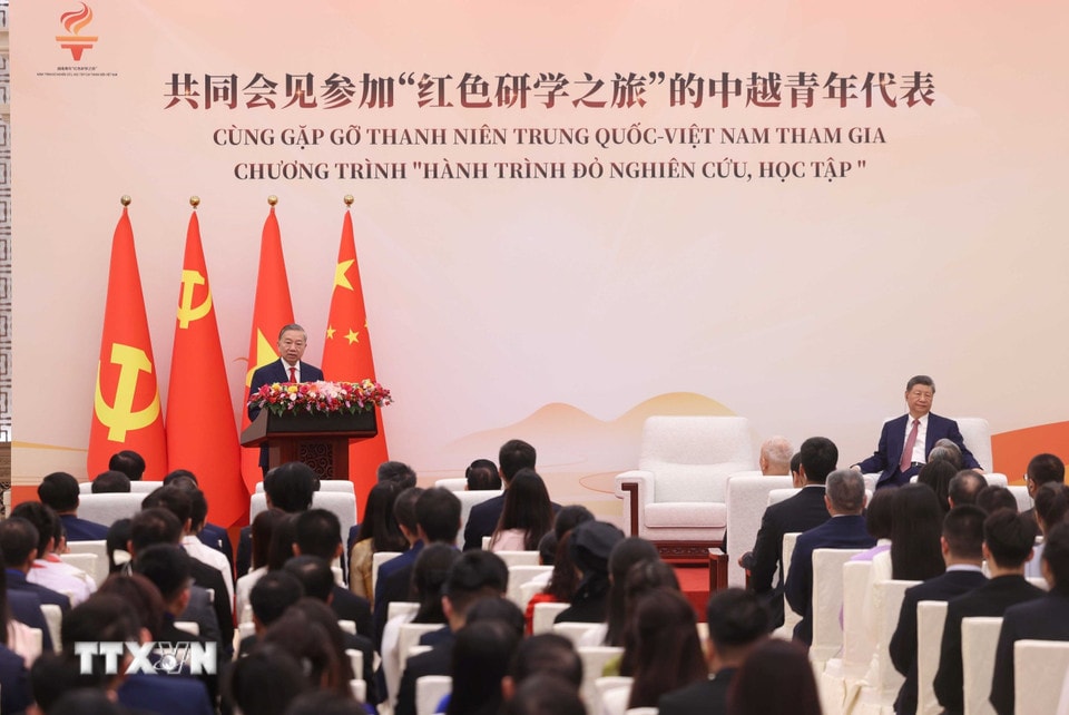 e3c7a36217d9-_ttxvn-tong-bi-thu-chu-tich-nuoc-to-lam-va-tong-bi-thu-chu-tich-nuoc-tap-can-binh-gap-go-thanh-nien-hai-nuoc-5.jpg