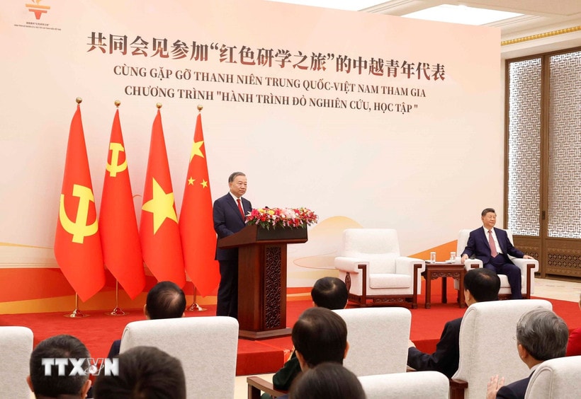 f0bb9a1211bf1-_ttxvn-tong-bi-thu-chu-tich-nuoc-to-lam-va-tong-bi-thu-chu-tich-nuoc-tap-can-binh-gap-go-thanh-nien-hai-nuoc-7.jpg