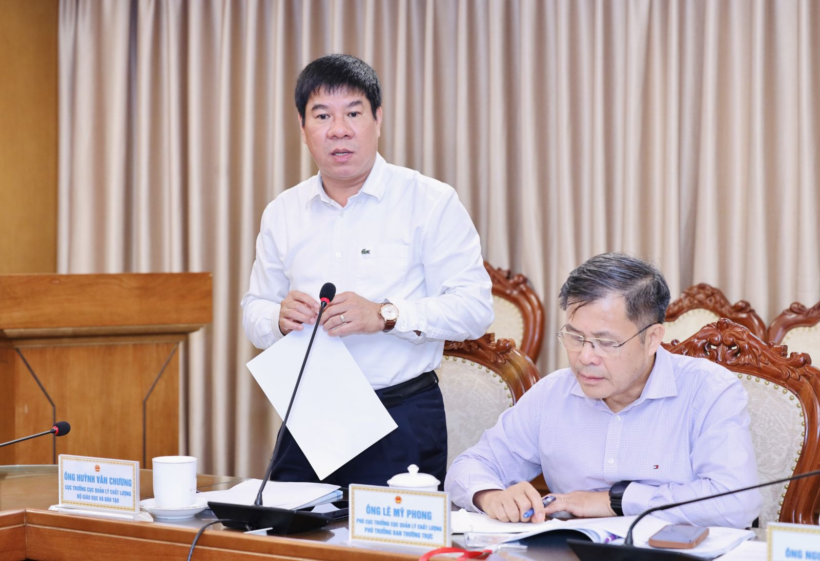 Cục trưởng Cục Quản lí chất lượng Huỳnh Văn Chương báo cáo tại phiên họp