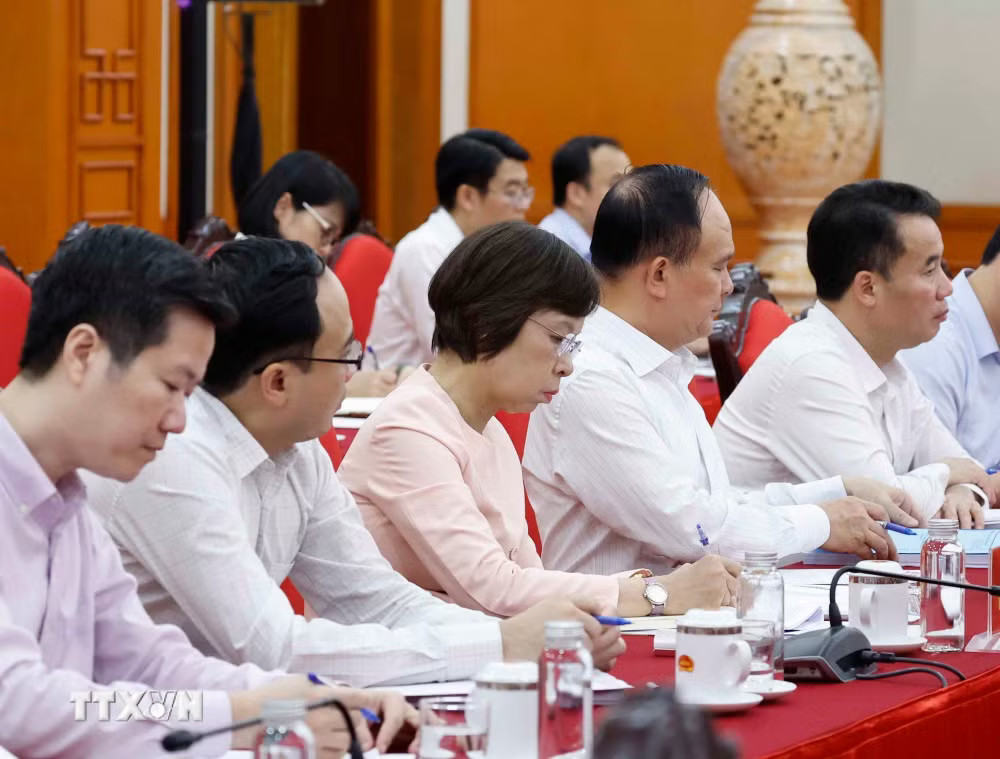Các đại biểu tham dự cuộc làm việc. (Ảnh: Thống Nhất/TTXVN) ttxvn-tong-bi-thu-chu-tich-nuoc-chu-tri-cuoc-lam-viec-ve-de-an-doi-moi-mo-hinh-phat-trien-dat-nuoc-9.jpg
