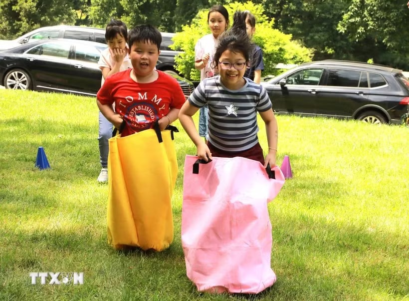 Children participate in the event (Photo: VNA)