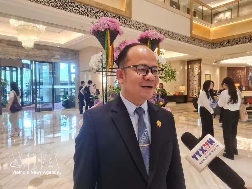 Khammone Chanthachith, Deputy Head of the Commission for Propaganda and Training of the Lao People's Revolutionary Party Central Committee, in the interview with the Vietnam News Agency. (Photo: VNA)
