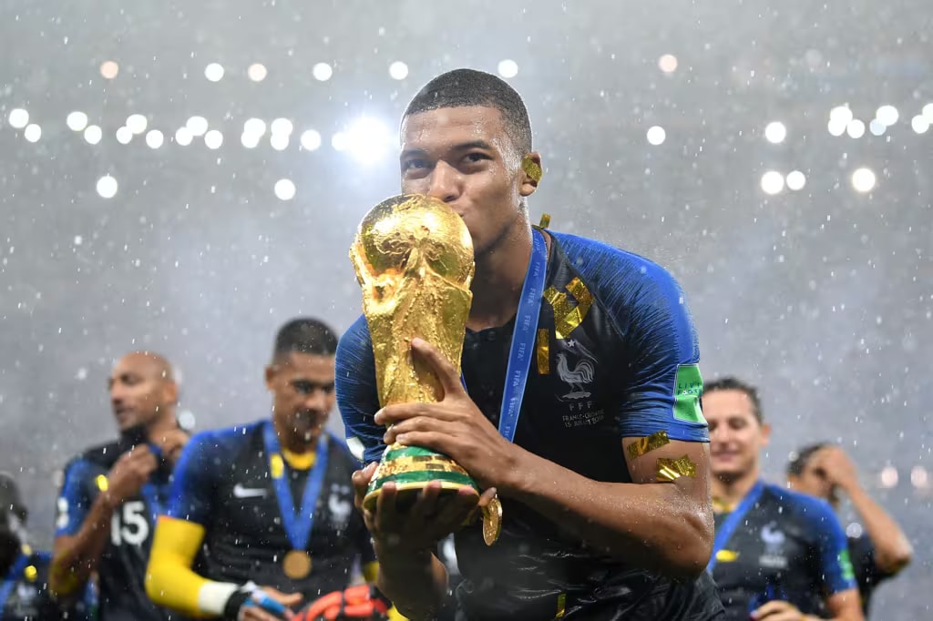 kylian-mbappe-kisses-the-fifa-world-cup-trophy-following-france-s-4-2-win-over-croatia-at-luzhniki-stadium-in-moscow-in-the-russia-2018-final.jpg