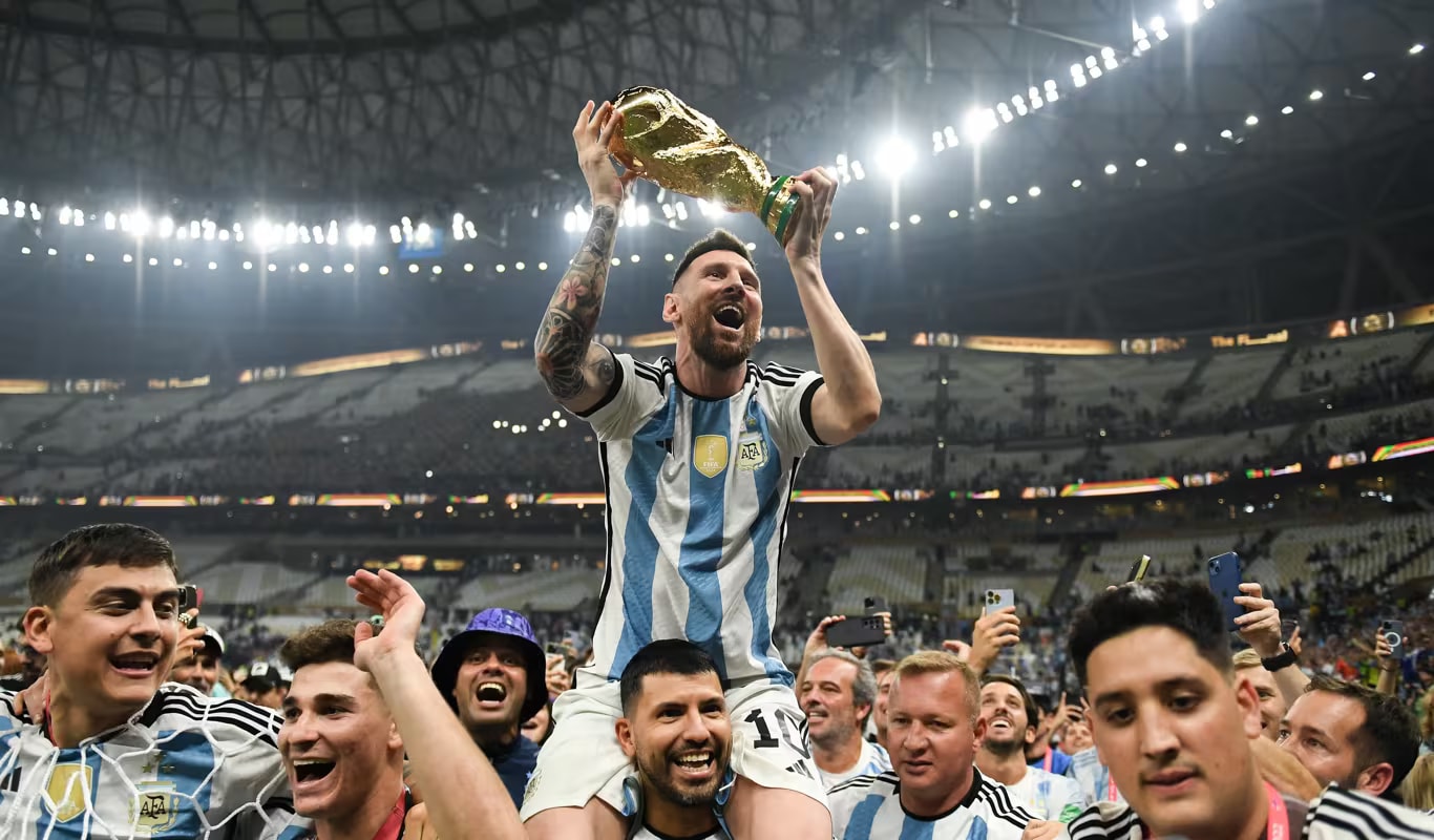 lionel-messi-holds-the-world-cup.jpg
