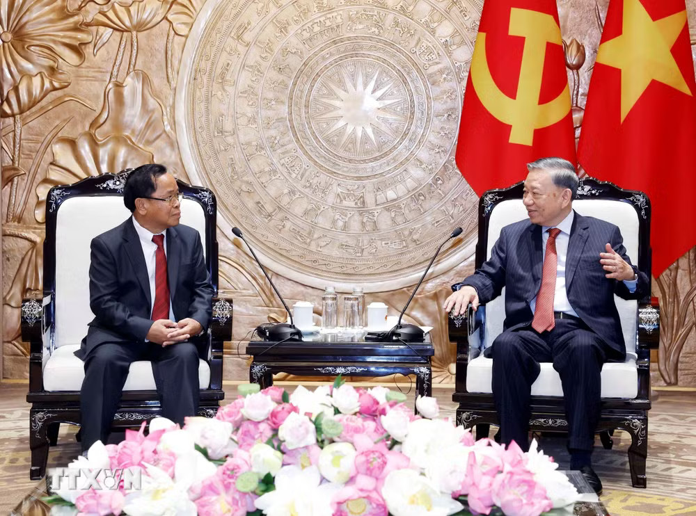 ttxvn-tong-bi-thu-chu-tich-nuoc-tiep-pho-thu-tuong-bo-truong-tu-phap-lao-16-3.jpg