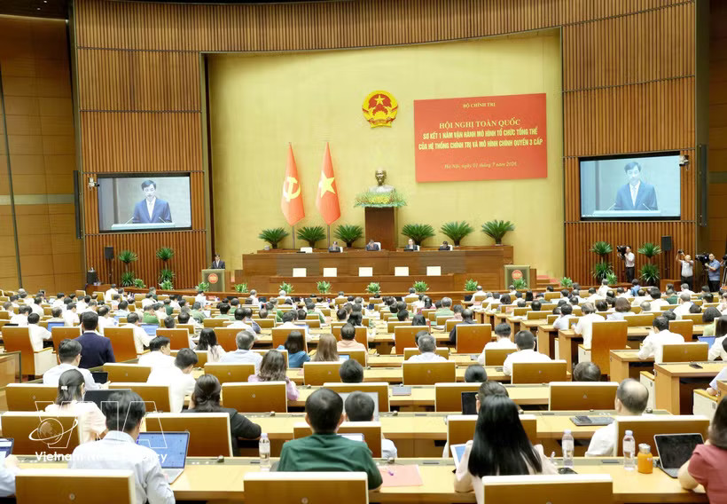 The conference reviews the one-year implementation of the overall organisational model of the political system and the three-tier administration model. (Photo: VNA)