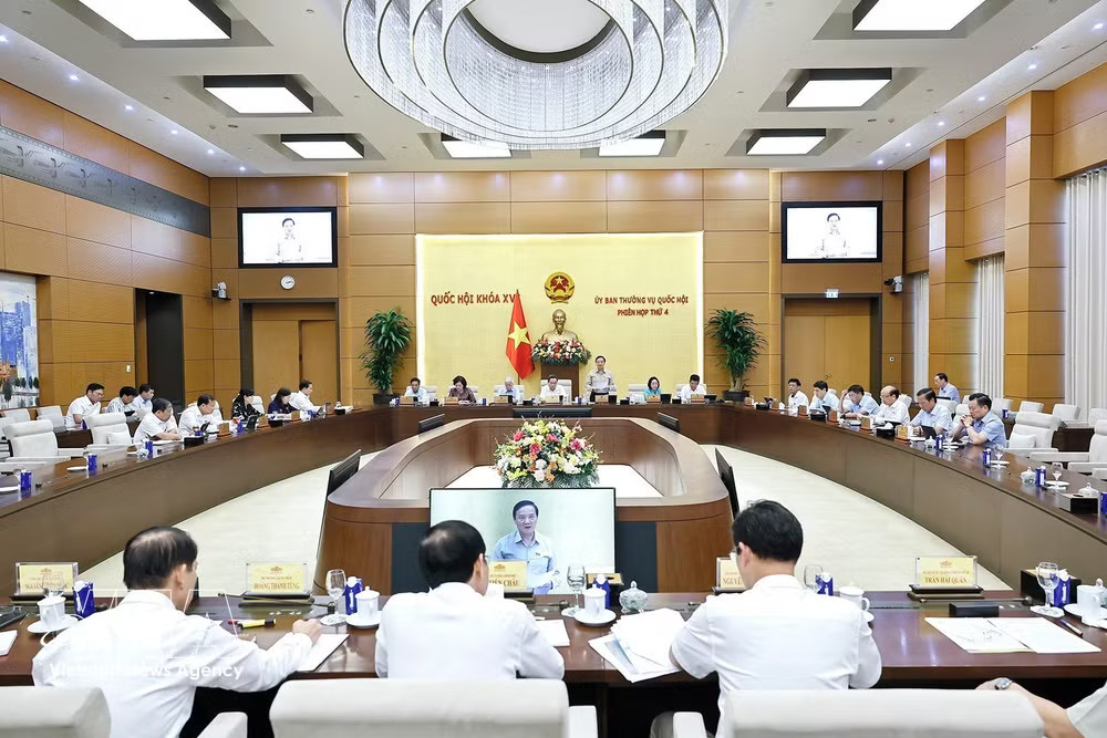 An overview of the meeting. (Photo: VNA) vnanet-man1boi-cho-y-kien-ve-cac-du-an-luat-sua-doi-8886203.jpg