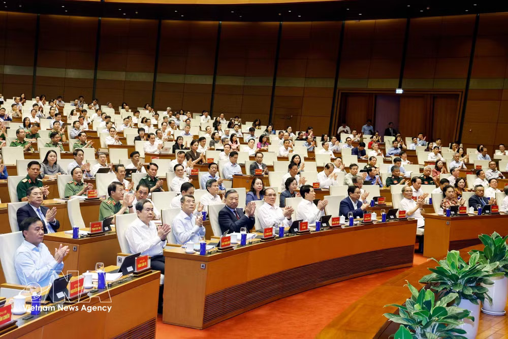Party General Secretary and State President To Lam (fourth from left, first row) and other delegates at the conference's central venue, Dien Hong Hall of the National Assembly House in Hanoi on July 29. (Photo: VNA) vnanet-resolutions2.jpg