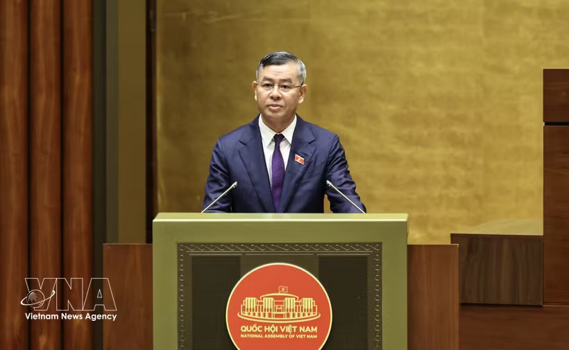 Minister of Finance Ngo Van Tuan presents the draft Law amending and supplementing several articles of the Law on Customs at the 16th National Assembly's first extraordinary session in Hanoi on August 3. (Photo: VNA)