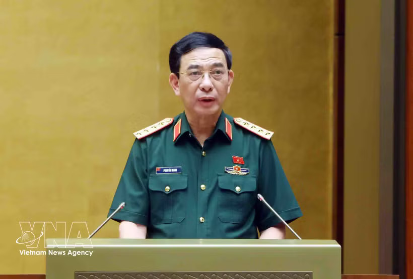 Deputy Prime Minister and Minister of National Defence Phan Van Giang presents the Government’s report at the 16th National Assembly (NA)’s first extraordinary session on August 23 (VNA) 