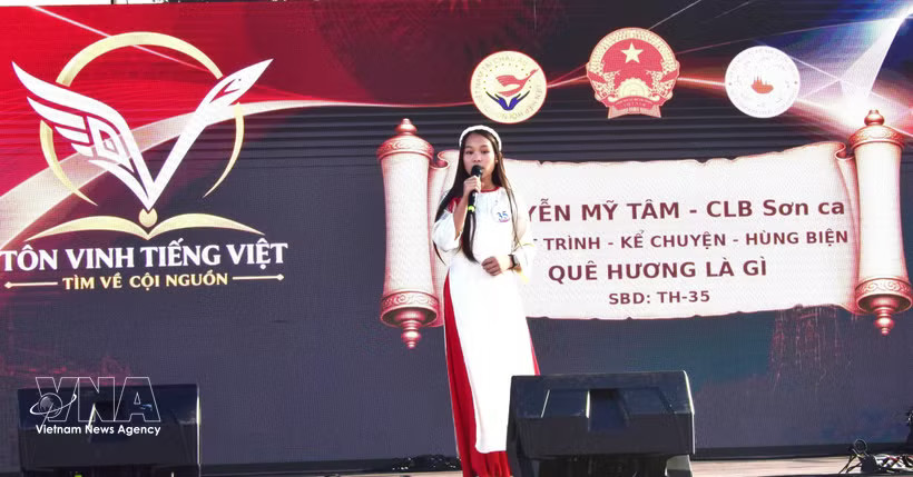 A contestant delivers her presentation titled 