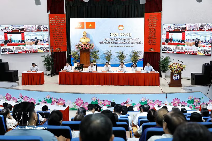 The event is connected via video link to venues in wards across Ho Chi Minh City. (Photo: VNA)