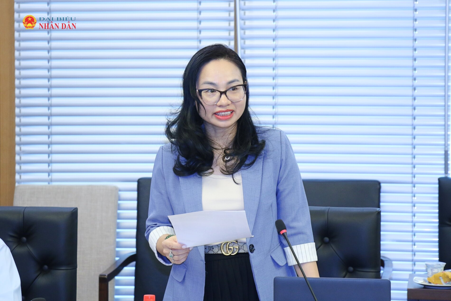 Vụ trưởng Vụ Tổng hợp Lương Thị Thu Hà báo cáo tại cuộc họp