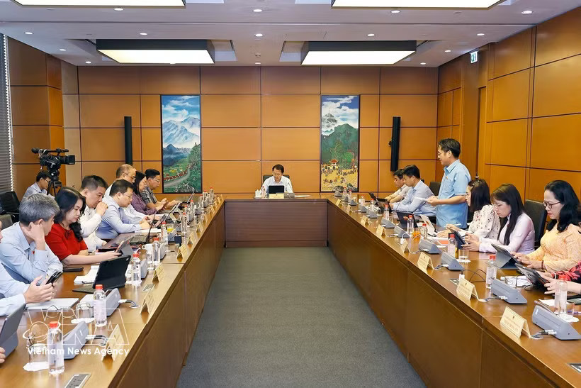Delegations from Lai Chau and An Giang provinces join a group discussion (Photo: VNA)