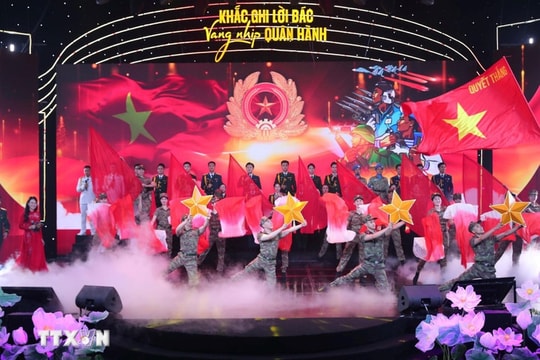 Party leader attends art event marking army’s decade of following Uncle Ho’s teachings