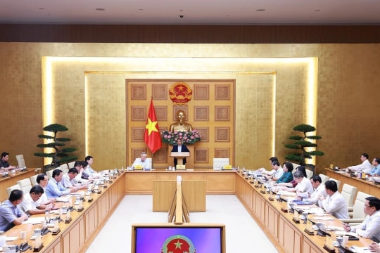 Two-tier local administration system operates stably, smoothly after one month: PM
