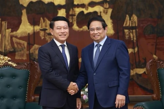 Vietnam willing to share experience in SOE reform with Laos: PM