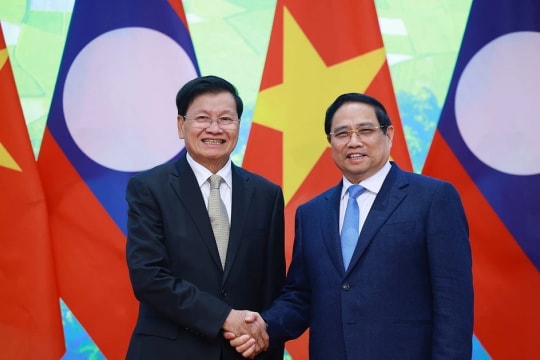 Prime Minister welcomes Lao Party General Secretary and President in Hanoi