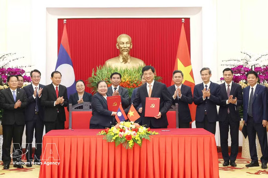 Vietnam, Laos strengthen cooperation on Party organisation