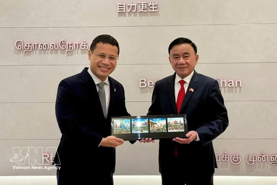 Key Party leader meets Singaporean PAP Chairman