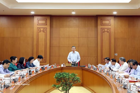 Top leader asks for sports development to build national strength