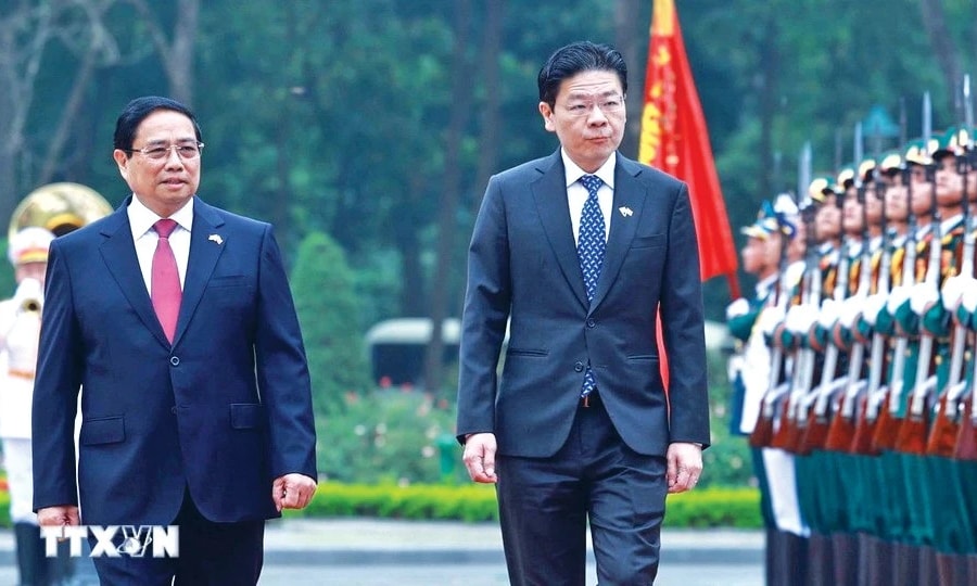 Thủ tướng Phạm Minh Chính chủ trì Lễ đón Thủ tướng Singapore và Phu nhân