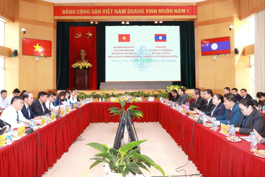 Hà Nội trao đổi kinh nghiệm quản trị chính quyền địa phương hai cấp với Lào